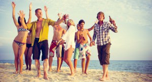 Young people on the beach bikini hostel miami